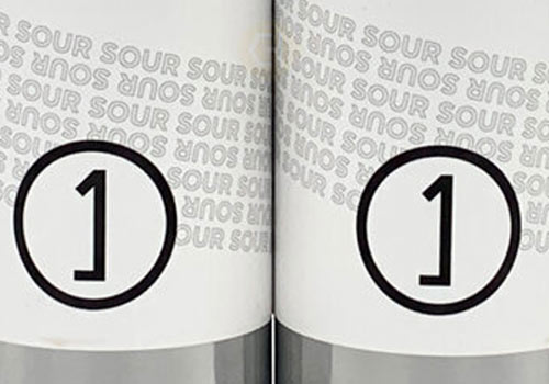 close up of Une Annee sour beer cans